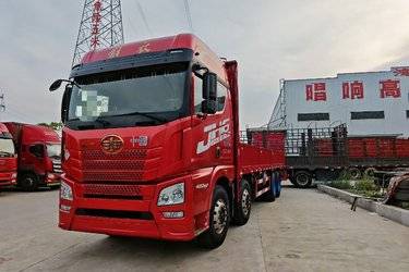 二手青岛解放 JH6重卡 420马力 8X4 8.6米栏板载货车(速比4.1)(国五) 前四后八 潍柴二手载货车 黄牌图片