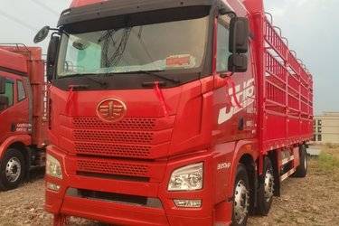 二手青岛解放 JH6重卡 320马力 6X2 9.5米仓栅式载货车(国六) 前四后四 锡柴二手载货车 黄牌图片