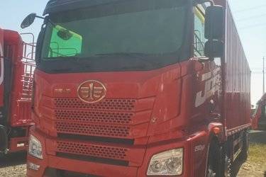 二手青岛解放 JH6重卡 290马力 6X2 9.5米厢式载货车(平地板)(国五) 前四后四 锡柴二手载货车 黄牌图片