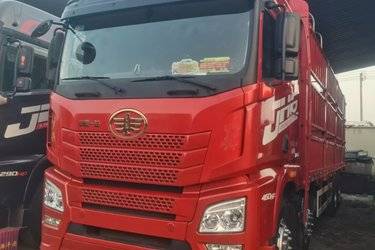 二手青岛解放 JH6重卡 460马力 8X4 9.5米仓栅式载货车(潍柴)(国五) 前四后八 潍柴二手载货车 黄牌图片