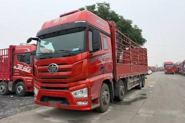 二手一汽解放 J7重卡 经典版 460马力 8X4 9.4米仓栅式载货车(国六) 前四后八 锡柴二手载货车 黄牌