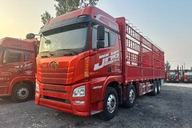 二手青岛解放 JH6重卡 领航版2.0 460马力 8X4 9.4米仓栅式载货车(国六) 前四后八 锡柴二手载货车 黄牌