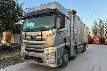 二手一汽解放 J7重卡 经典版 560马力 8X4 9.5米AMT自动档厢式载货车(国六) 前四后八 锡柴二手载货车 黄牌图片