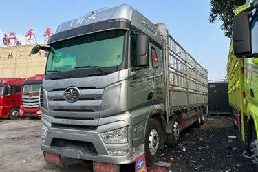 二手一汽解放 J7重卡 经典版 460马力 8X4 9.4米仓栅式载货车(国六) 前四后八 锡柴二手载货车 黄牌图片