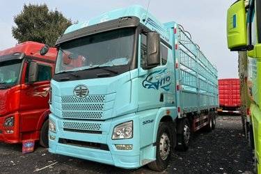 二手青岛解放 JH6 智尊版2.0 520马力 8X4 9.5米仓栅式载货车(国六) 前四后八 锡柴二手载货车 黄牌