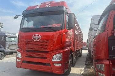 二手青岛解放 JH6重卡 领航版2.0 350马力 8X2 9.5米仓栅式载货车(国六) 前四后六 锡柴二手载货车 黄牌图片