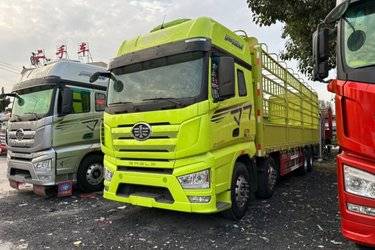 二手一汽解放 J7重卡 460马力 8X4 9.4米栏板载货车(国六) 前四后八 锡柴二手载货车 黄牌图片