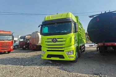 二手一汽解放 J7重卡 经典版 460马力 8X4 9.4米仓栅式载货车(国六) 前四后八 锡柴二手载货车 黄牌图片