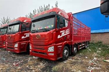 二手青岛解放 JH6重卡 430马力 8X4 9.5米仓栅式载货车(国五) 前四后八 潍柴二手载货车 黄牌图片