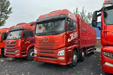 二手青岛解放 JH6重卡 领航版2.0 290马力 6X2 9.4米仓栅式载货车(国五) 前四后四 锡柴二手载货车 黄牌图片