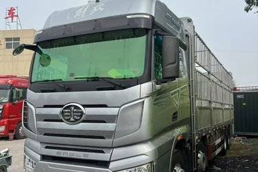 二手一汽解放 J7重卡 经典版 460马力 8X4 9.4米仓栅式载货车(国六) 前四后八 锡柴二手载货车 黄牌图片