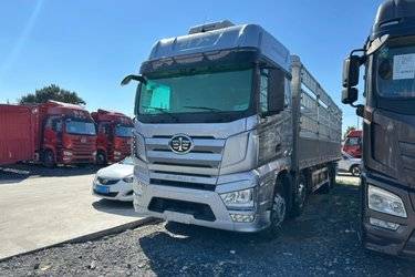 二手一汽解放 J7重卡 460马力 8X4 9.4米仓栅式载货车(国六) 前四后八 锡柴二手载货车 黄牌图片