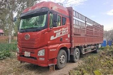 二手青岛解放 JH6重卡 领航版2.0 320马力 6X2 9.5米仓栅式载货车(国六)(4.111速比)(国六) 前四后四 大柴二手载货车 黄牌