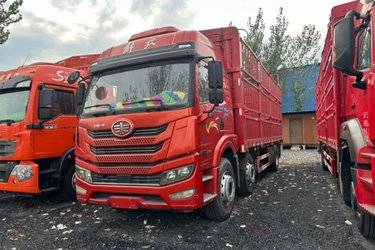 二手青岛解放 悍V2.0重卡 290马力 8X4 8.8米仓栅式载货车(国六) 前四后六 锡柴二手载货车 黄牌