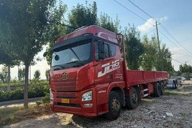二手青岛解放 JH6重卡 420马力 8X4 9.5米栏板载货车(国五) 前四后八 锡柴二手载货车 黄牌