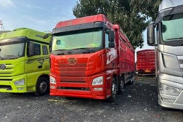 二手青岛解放 JH6重卡 领航版2.0 460马力 8X4 9.4米仓栅式载货车(国六) 前四后八 锡柴二手载货车 黄牌
