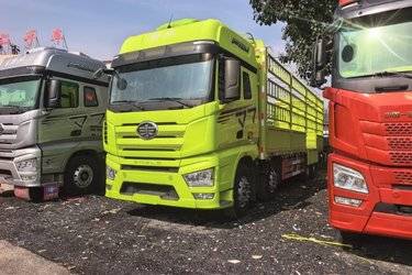 二手一汽解放 J7重卡 460马力 8X4 9.4米仓栅式载货车(国六) 前四后八 锡柴二手载货车 黄牌