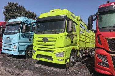 二手一汽解放 J7重卡 460马力 8X4 9.4米仓栅式载货车(国六) 前四后八 锡柴二手载货车 黄牌