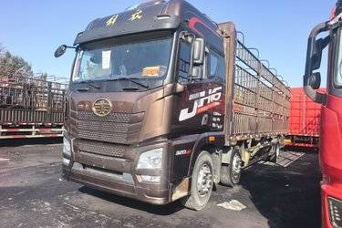 二手青岛解放 JH6重卡 领航版2.0 320马力 6X2 9.5米仓栅式载货车(国五) 前四后四 大柴二手载货车 黄牌