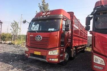 二手一汽解放 新J6P重卡 280马力 6X2 9.4米仓栅式载货车(国五) 前四后四 锡柴二手载货车 黄牌