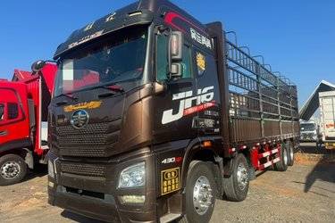二手青岛解放 JH6重卡 430马力 8X4 9.5米仓栅式载货车(国五) 前四后八 潍柴二手载货车 黄牌图片