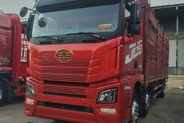 二手青岛解放 JH6重卡 领航版 290马力 6X2 9.5米仓栅式载货车(国五) 前四后四 锡柴二手载货车 黄牌图片