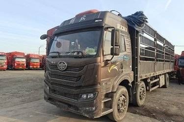 青岛解放 悍V2.0重卡 290马力 6X2 9.5米仓栅式载货车(国六) 前四后四 锡柴二手载货车 黄牌