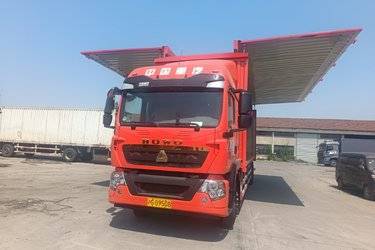 二手中国重汽 HOWO TX 290马力 4X2 9.6米翼开启厢式载货车(国六) 单桥 曼二手载货车 黄牌图片