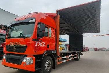 二手中国重汽 HOWO TX 290马力 4X2 9.6米翼开启厢式载货车(国六) 单桥 曼二手载货车 黄牌