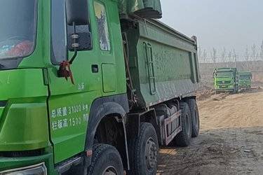 二手中国重汽 HOWO重卡 380马力 8X4 6.5米自卸车(国五) 前四后八 中国重汽二手自卸车 黄牌图片