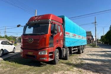 二手一汽解放 新J6P重卡 2020款 领航版 460马力 8X4 9.4米仓栅式载货车(国五) 前四后八 锡柴二手载货车 黄牌