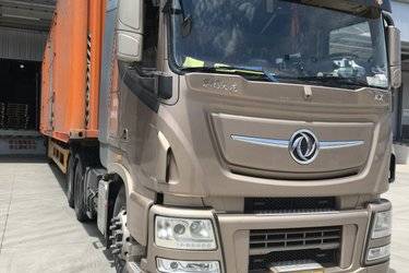 二手东风商用车 天龙旗舰KX 560马力 6X4自动挡牵引车(AMT手自一体)(国五) 双驱 东风康明斯二手牵引车 黄牌图片