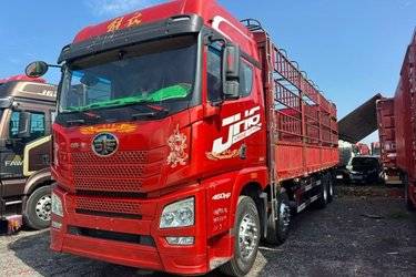 二手青岛解放 JH6重卡 460马力 8X4 9.5米仓栅式载货车(国五) 前四后八 锡柴二手载货车 黄牌