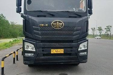 二手青岛解放 JH6重卡 460马力 8X4 9.5米仓栅式载货车(国五) 前四后八 锡柴二手载货车 黄牌