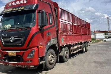 二手东风商用车 天龙KL重卡 465马力 8X4 9.4米仓栅式载货车(国五) 前四后八 雷诺二手载货车 黄牌图片