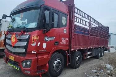 二手福田 欧曼EST 6系重卡 430马力 8X4 9.45米仓栅式载货车(国五) 前四后八 福田康明斯二手载货车 黄牌图片