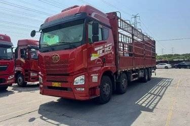 二手青岛解放 JH6重卡 领航版2.0 460马力 8X4 9.4米仓栅式载货车(国五) 前四后八 潍柴二手载货车 黄牌图片