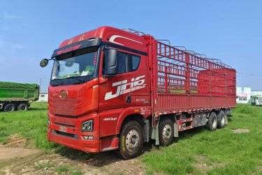 二手青岛解放 JH6重卡 智尊版2.0 460马力 8X4 9.4米仓栅式载货车(速比3.727)(国五) 前四后八 锡柴二手载货车 黄牌图片