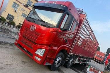 二手青岛解放JH6 智享版 7.8L柴油 350马力 8X2 一汽解放10档 9.4米仓栅式载货车(国六) 前四后六 锡柴二手载货车 黄牌图片