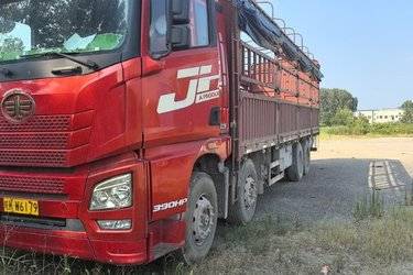 二手青岛解放 JH6重卡 460马力 8X4 9.5米仓栅式载货车(自动挡)(国五) 前四后八 锡柴二手载货车 黄牌图片