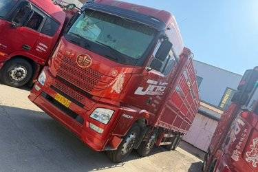 二手青岛解放 JH6 智享版 460马力 8X4 9.5米AMT自动档仓栅式载货车(国六) 前四后八 锡柴二手载货车 黄牌图片