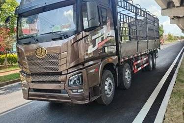 二手青岛解放 JH6重卡 智尊版2.0 460马力 8X4 9.4米仓栅式载货车(速比3.727)(国五) 前四后八 潍柴二手载货车 黄牌图片