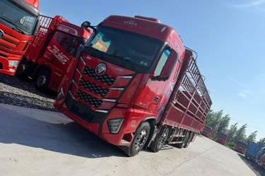 二手福田 欧曼EST 星辉版 580马力 8X4 9.56米AMT自动档仓栅式载货车(国六) 前四后八 福田康明斯二手载货车 黄牌图片
