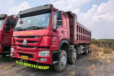 二手中国重汽 HOWO重卡 380马力 8X4 7.8米自卸车(国五) 前四后八 中国重汽二手自卸车 黄牌图片