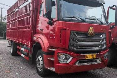 二手中国重汽 豪沃NX中卡 270马力 4X2 6.7米仓栅式载货车(国六) 单桥 曼二手载货车 黄牌