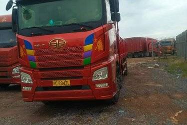 二手青岛解放 JH6重卡 320马力 6X2 9.5米栏板载货车(国五) 前四后四 锡柴二手载货车 黄牌