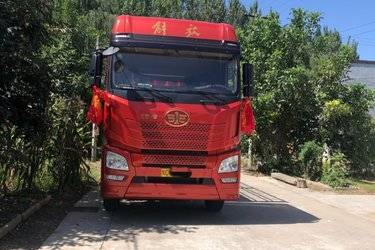 二手青岛解放 JH6重卡 领航版2.0 460马力 8X4 8.6米仓栅式载货车(国六) 前四后八 锡柴二手载货车 黄牌图片