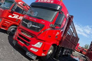二手东风商用车 天龙旗舰KX 560马力 8X4 9.4米AMT自动档仓栅式载货车(国六) 前四后八 康明斯二手载货车 黄牌