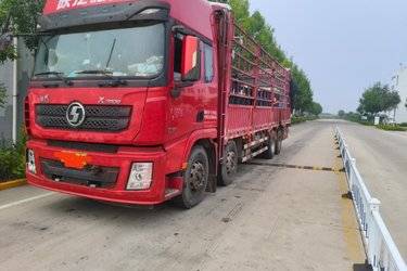 二手陕汽重卡 德龙X3000 轻量化版 430马力 8X2 9.5米仓栅式载货车(国五) 前四后六 潍柴二手载货车 黄牌图片
