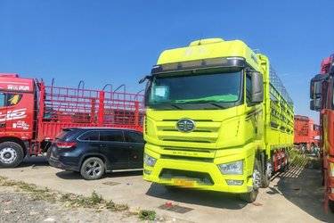 二手一汽解放 J7重卡 460马力 8X4 9.5米仓栅式载货车(国六) 前四后八 锡柴二手载货车 黄牌图片